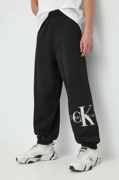 Calvin Klein Jeans pantaloni de trening barbati, culoarea negru, neted  PPYX-SPM00N_99X (Pantaloni trening barbati) - Preturi