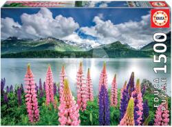 Educa Puzzle Lupins On The Shores of Lake Sils Switzerlland Educa 1500 darabos és Fix ragasztó (19271)