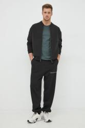 Calvin Klein Jeans pantaloni de trening barbati, culoarea negru, cu imprimeu 9BYY-SPM0HP_99X