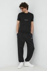 Calvin Klein melegítőnadrág fekete, nyomott mintás - fekete S - answear - 22 990 Ft