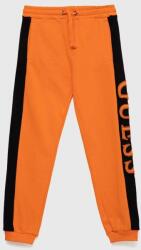 Guess pantaloni de trening din bumbac pentru copii culoarea portocaliu, cu imprimeu PPYX-SPB00P_23X