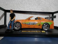 Jada Movie Cars Toyota Supra (1995) cu figurina Brian scala 1/181/43 (20266)