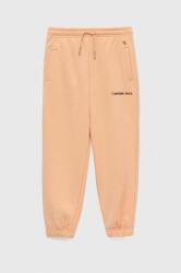Calvin Klein Jeans pantaloni de trening pentru copii culoarea portocaliu, neted PPYX-SPG004_20X