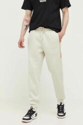 Nicce pantaloni de trening culoarea bej, cu imprimeu PPYX-SPM0LE_02X