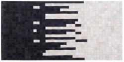 Beliani Fekete és fehér bőrszőnyeg 80 x 150 cm BOLU