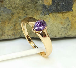 Aranyszínű antiallergén gyűrű lila kristályokkal