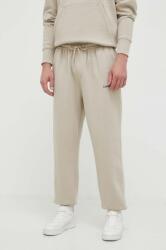 Calvin Klein Jeans pantaloni de trening culoarea bej, cu imprimeu PPYX-SPM0C0_80A