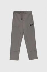 Calvin Klein Jeans pantaloni de trening pentru copii culoarea gri, neted 9BYX-SPB015_90X