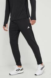 Adidas futónadrág Own the Run fekete, nyomott mintás, IK5024 - fekete L