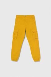 GUESS pantaloni de bumbac pentru copii culoarea galben, neted PPYH-SPB00U_11X