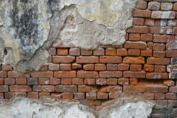 Dimex Vlies Fotótapéta - Old brick wall partially damaged - 375x250 cm (MS-5-2677)