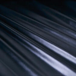 Takoy Ortalion anyag /Ruházati vízlepergetős anyag fekete - műbőr hatású