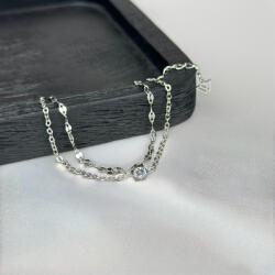 WHITE'S Ezüst nemesacél karkötő cirkóniával