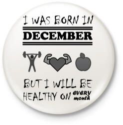 printfashion Decemberben születtem de minden hónapban egészségesen élek - Kitűző, hűtőmágnes - Fehér (3079206)