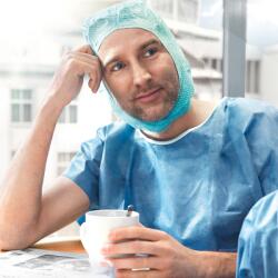 HARTMANN Foliodress® zsilipruha (kék), kerek nyakkivágással (S; 1 db) (9925385)