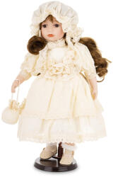 Art-Pol Különleges barna hajú porcelán baba korhű krém színű ruhában kézitáskával 45x28x24cm (177055)