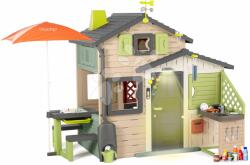 Smoby Căsuță Prietenilor cu spațiu de relaxare în culori naturale Friends House Evo Playhouse Life Smoby sub umbrela de soare cu jocuri și set meteorologic extensibil (SM810251-2J) Casuta pentru copii