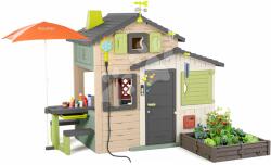 Smoby Házikó Jóbarátok asztalka és játékokkal a napernyő alatt Friends House Evo Playhouse Life Smoby natúr színekben bővíthető (SM810251-2R)