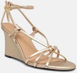 Tommy Hilfiger bőr szandál METAL LEATHER KNOTS WEDGE SANDAL sárga, FW0FW08801 - arany Női 38