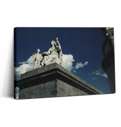 Wallfluent Vászonkép Edzőterembe Látványos Nő És Angyalka szobor 30x20 cm (010030010150000075581)