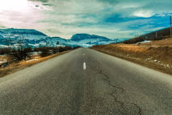 Dimex Vlies Fotótapéta - Road to snowy mountain - 375x250 cm (MS-5-1644)