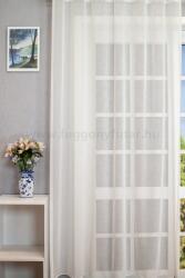 FüggönyFutár Webáruház Ecrü színű, batiszt jellegű, tetra sablet fényáteresztő függöny, ólomzsinóros, egyedi méretre, készre varrjuk