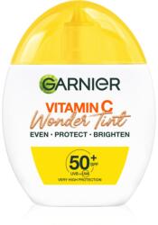 Garnier Vitamin C Wonder Tint gyengéd tonizáló fluid SPF 50+ árnyalat Muedium 40 ml