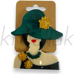 Zöld nő kalapban kitűző