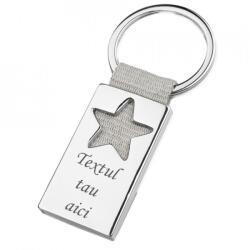  Breloc metalic gravat personalizat cu textul tau. stea. 45x25 mm. argintiu