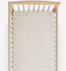 Goldea gyermek gumis pamut lepedő kiságyba - bézs pöttyös 70 x 140 cm