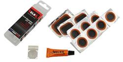 VELOX VTT belső javítókészlet (8 db 25 mm-es, 2 db 35x25 mm-es, 1 db 50x30 mm-es folt, 5 g ragasztó, kaparó, használati útmutató) VELOX Egyéb járművek Kerékpározás Kerékpár-alkatrészek Kerékpárkerekek és ke
