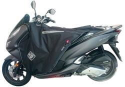 Tucano Urbano R202X lábtakaró Honda 125 PCX-hez (TERMOSCUD, S. G. A. S. Anti-flap rendszer) TUCANO URBANO Váz, idomok és járműkiegészítők Járműtakarók és lábvédők Lábvédő kötények és lábtakarók