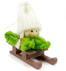 Yala Design Karácsonyfadísz, kislány szánkózik zöld ruhában fehér sapkával 4438B (4438-B/484345)
