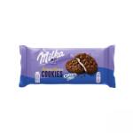 Milka Cookies Sensations Oreo Creme kakaós keksz tejcsokoládé darabokkal, vaníliás töltelékkel 156 g - online