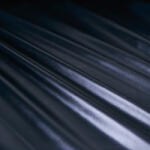 Takoy Ortalion anyag /Ruházati vízlepergetős anyag fekete - műbőr hatású