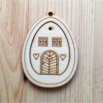  Két részes fa tojás. Külső méret: 46x63 mm, belső tojás mérete: 31x42 mm