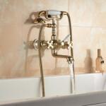 Inter Ceramic Baterie cada-dus Inter Ceramic Sahara dubla comanda auriu lucios cu set de dus (606086)