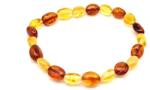 R. M. ékszer Borostyán sárga barna pebble karkötő 7-9x5-7mm (023693)