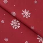 Goldea pamutvászon - hópelyhek piros alapon 160 cm