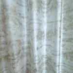 FüggönyFutár Webáruház Leon - Bézs-arany színű fényes, csillogó dekorfüggöny, egyedi méretre, készre varrjuk