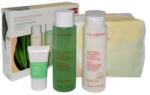 Clarins Zestaw Clarins Velvet Cleansing Milk 200ml + Purifying Toning Lotion 200ml + Pure Scrub 15ml + Cosmetics Bag (20081143)