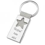 Breloc metalic gravat personalizat cu textul tau. stea. 45x25 mm. argintiu