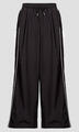 PUMA Futónadrágok / Melegítők T7 Relaxed Woven Track Pants op Fekete EU XS