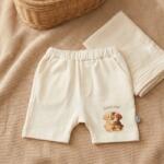 Rainy Pantaloni scurți pentru bebeluși Doggy Hug 62-92 cm ecru