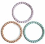 Mushie Pearl Teething Bracelet jucărie pentru dentiție Lilac/Cyan/Soft Peach 3 buc